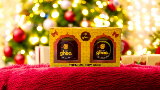 Just Ghee Empty Gift Boxes for 150g Ghee Jars displayed with holiday decorations.